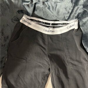 Calvin Klein size medium low rise black sweatpants with logo waistband